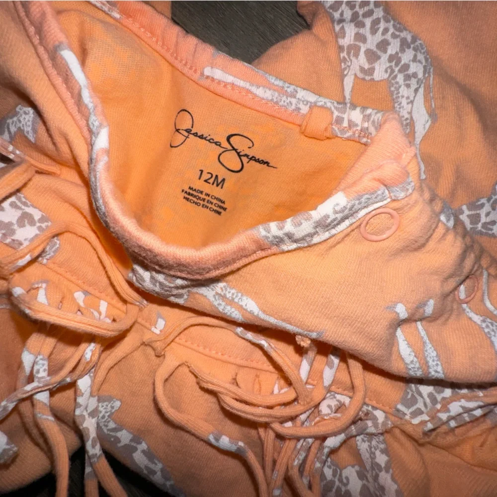 Jessica Simpson Orange Giraffe Print Romper